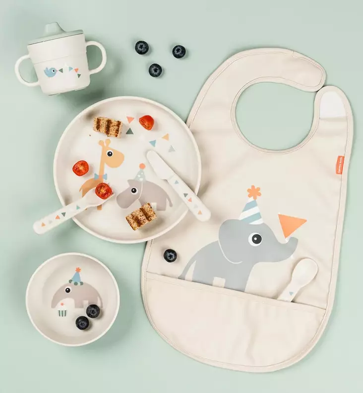 Done by Deer Taskullinen ruokalappu tarrakiinnityksellä celebration sand wauva - Ruokalaput - 1323239 - 1