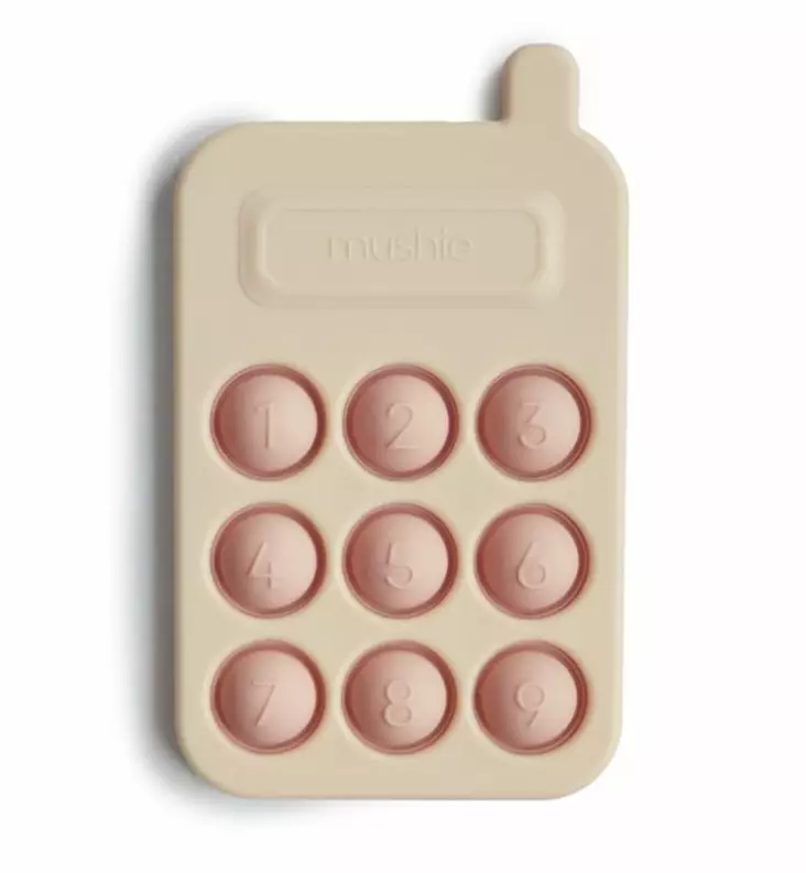 mushie_taaperon_aktiviteettilelu_press_toy_leikkipuhelin_wauva - Vaunu- ja aktiviteettilelut vauvoille - 2860019 - 1